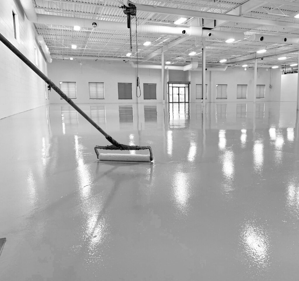 Epoxy coated concrete flooring system